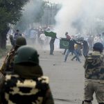 Kashmiri protestors clash with Indian government forces after Eid prayers in downtown Srinagar on June 26, 2017. The Islamic fasting month of Ramadan, which ended with the Eid al-Fitr feast, was particularly bloody one for mainly Muslim Kashmir. Fifty-one people were killed this Ramadan in the restive region according to Khurram Parvez from the Jammu Kashmir Coalition of Civil Society, which monitors conflict-related deaths. / AFP PHOTO / TAUSEEF MUSTAFA