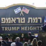 Israeli Prime Minister Benjamin Netanyahu (2nd-R) and US Ambassador to Israel David Friedman (L) applaud after unveiling the place-name sign for the new settlement of "Ramat Trump", or "Trump Heights" in English, named after the incumbent US President, during an official ceremony in the Israeli-annexed Golan Heights on June 16, 2019. - Netanyahu unveiled a "Trump Heights" sign to mark the site of the new settlement, which comes after the US president in late March recognised Israeli sovereignty over the part of the strategic plateau it seized from Syria in the 1967 Six-Day war. (Photo by Jalaa MAREY / AFP)