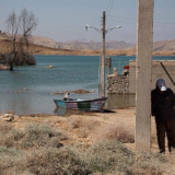 نمایی از زیر آب رفتن یکی از سروستاها در اطراف سد گتوند